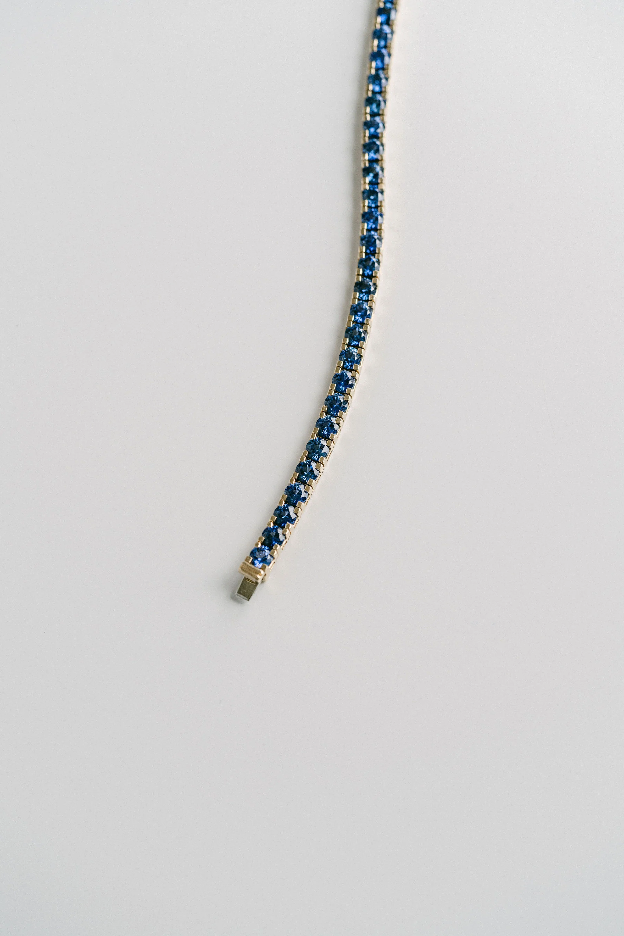 Round Blue Sapphire Tennis Bracelet With Flat Prongs - Image 3