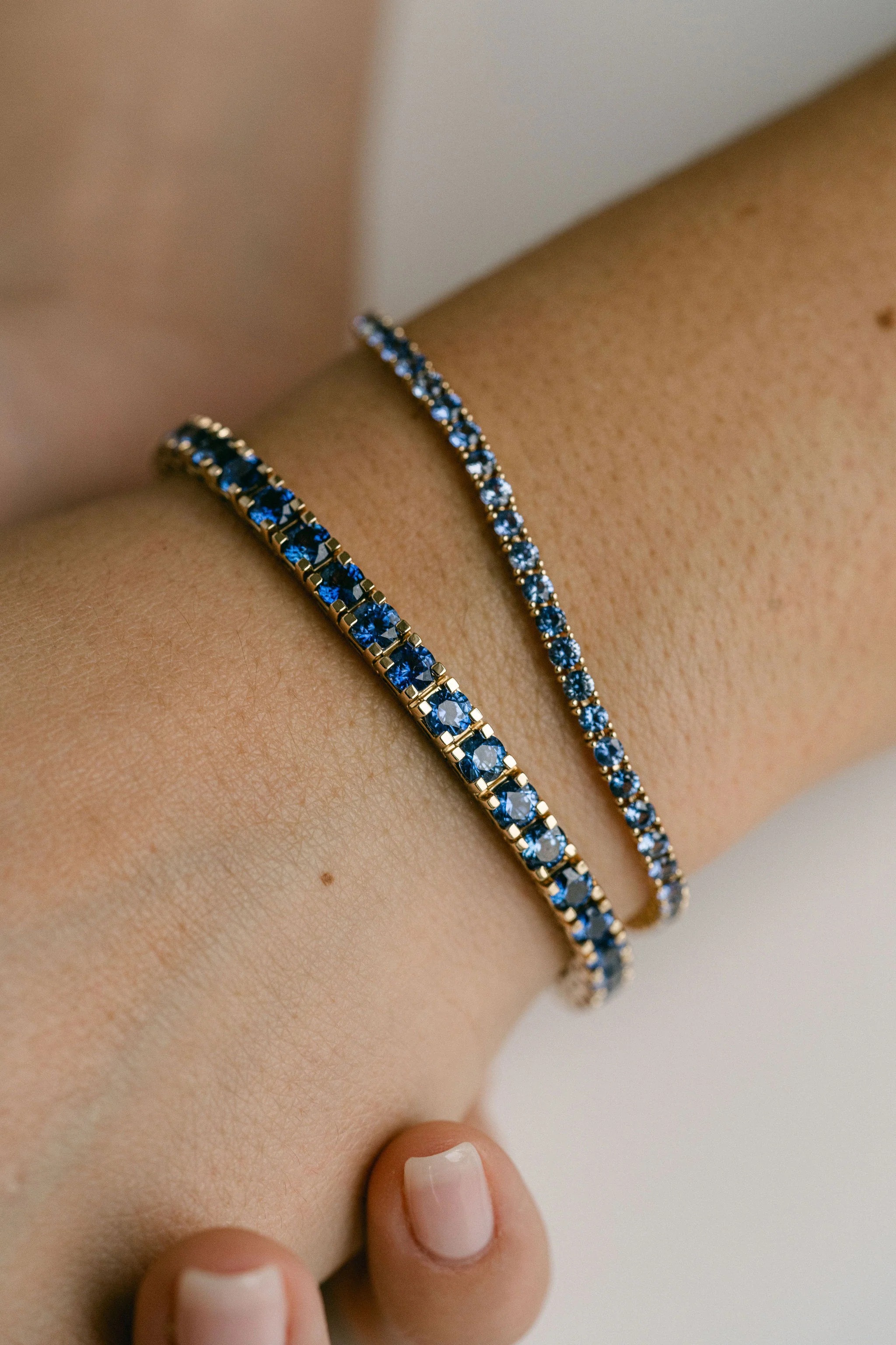 Round Blue Sapphire Tennis Bracelet With Flat Prongs - Image 4