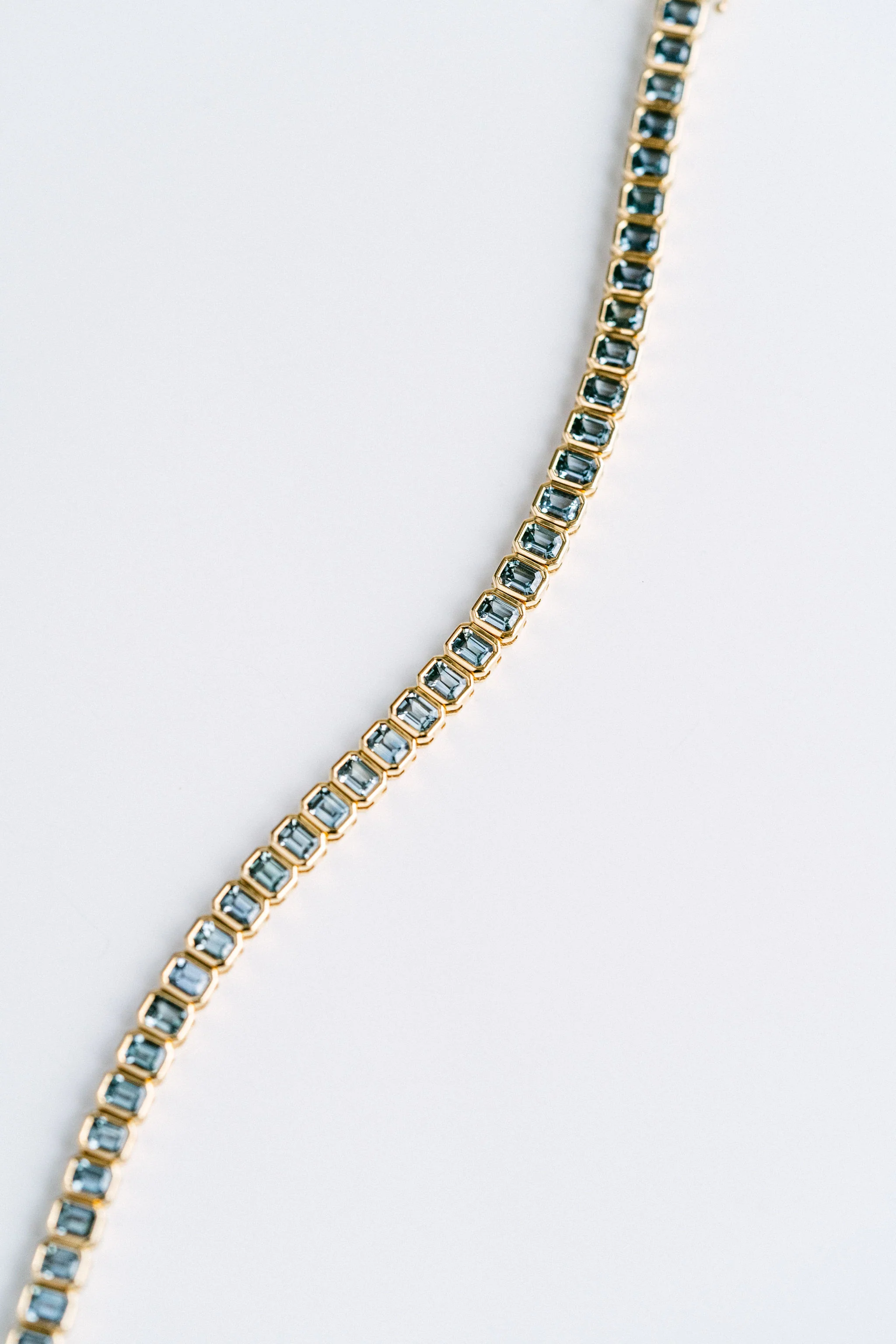 Emerald Cut Blue-Green Sapphire Bezel Tennis Bracelet - Image 4