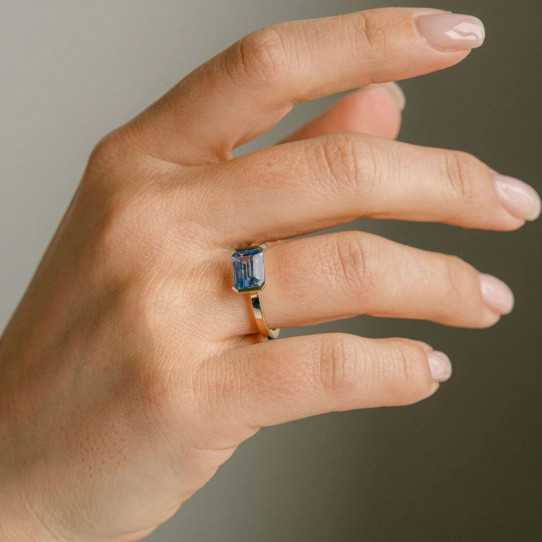 Emerald Cut Blue Sapphire East-West Half Bezel - Image 5