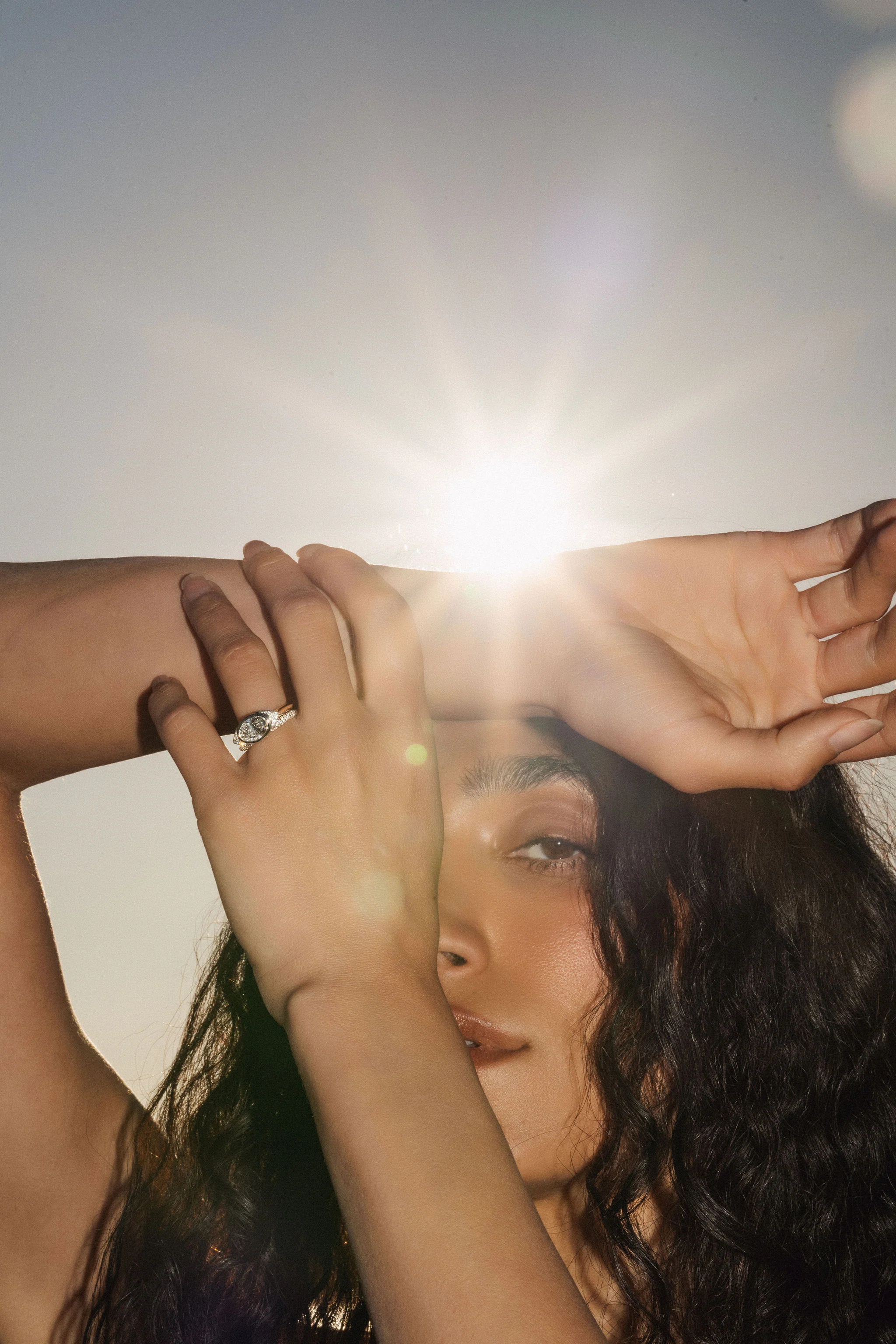 Oval Diamond Two Tone Ring With Diamond Eye Halo - Image 3