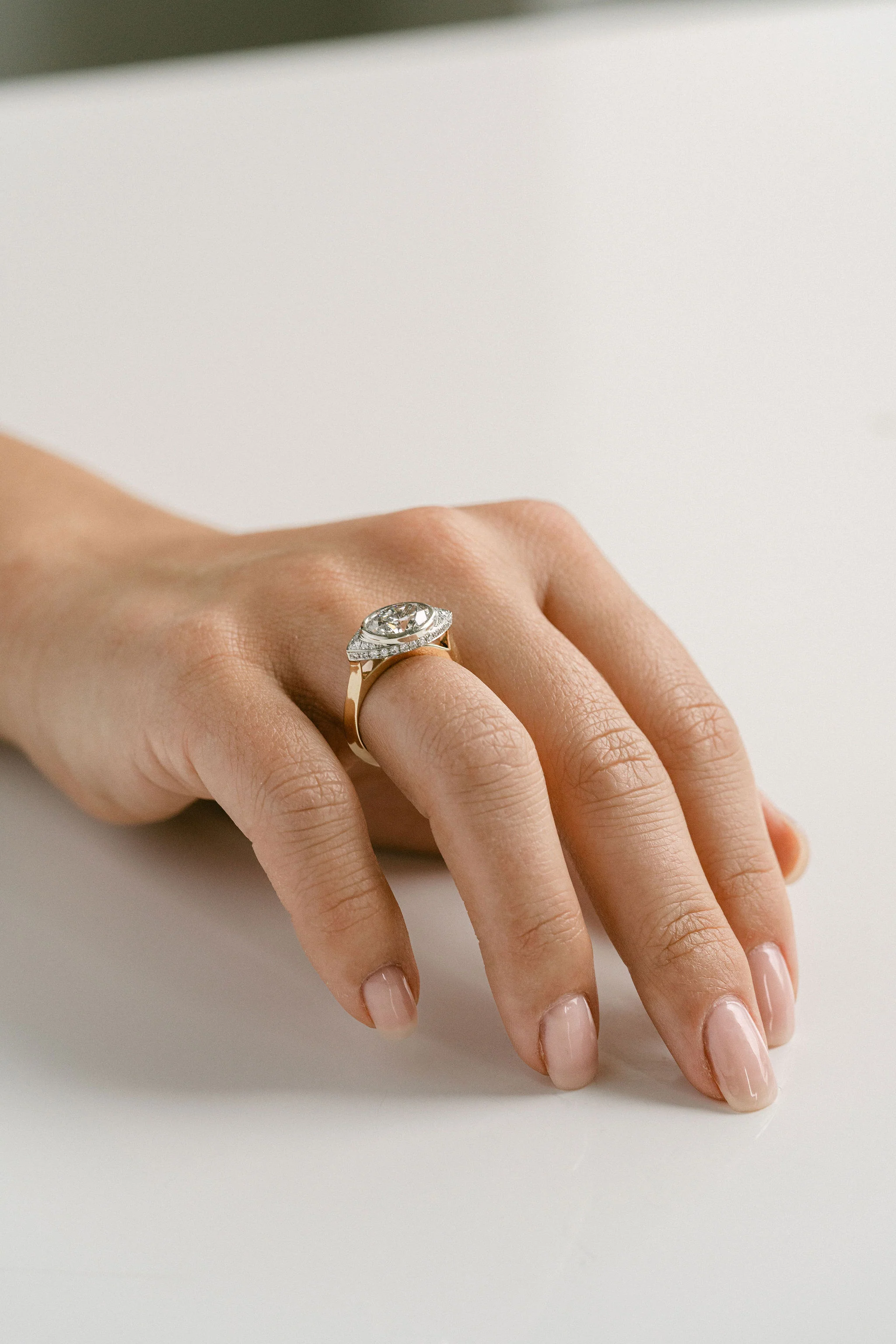 Oval Diamond Two Tone Ring With Diamond Eye Halo - Image 5