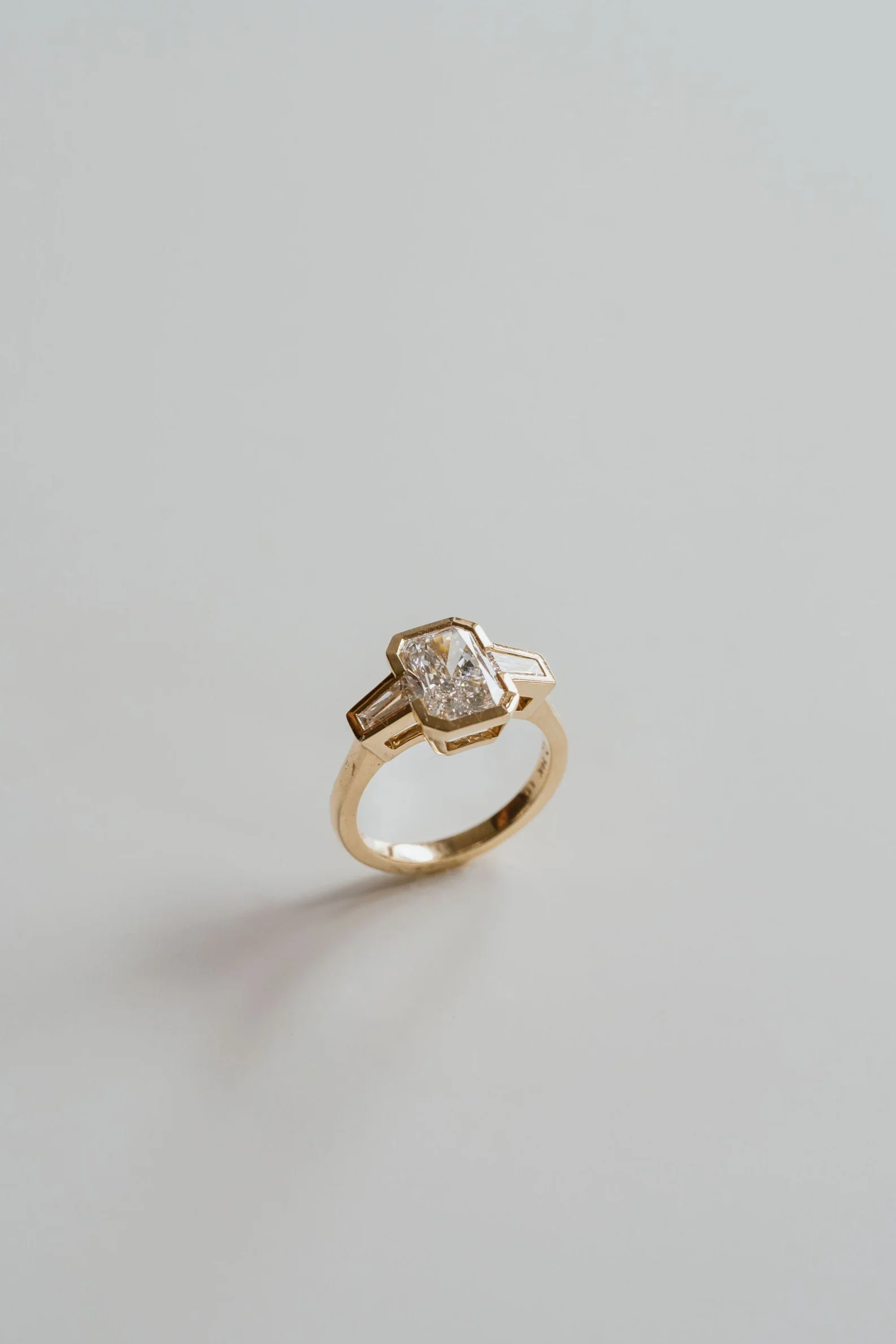 Radiant Cut Diamond Full Bezel With Tapered Baguette Accents - Image 3